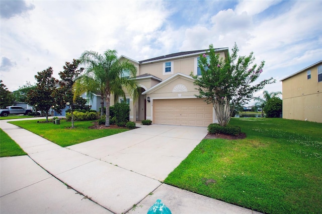 1748 Thetford Cir, Orlando, FL 32824 - view of front of property featuring stucco siding, a front lawn, driveway, and an attached garage