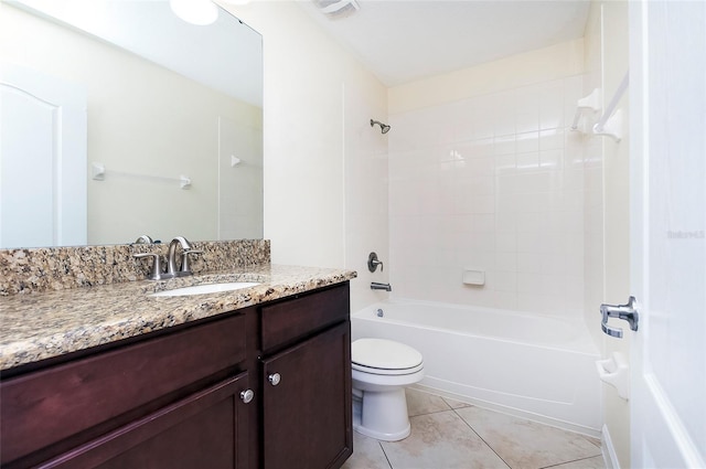 1748 Thetford Cir, Orlando, FL 32824 - bathroom featuring toilet, vanity,  shower combination, and tile patterned flooring