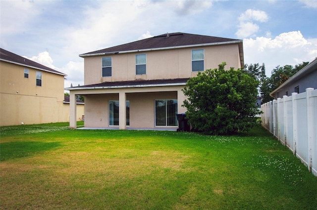 1748 Thetford Cir, Orlando, FL 32824 - back of property with stucco siding