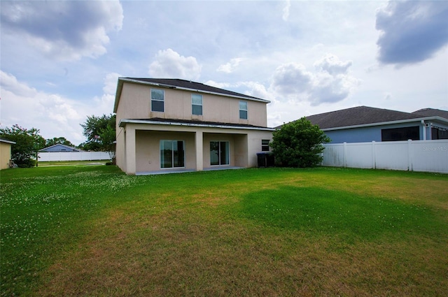 1748 Thetford Cir, Orlando, FL 32824 - back of house with stucco siding and central AC
