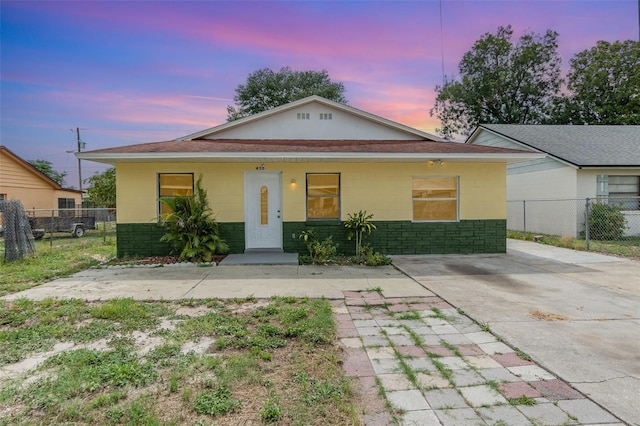 450 S Buena Vista Ave, Orlando, FL 32835 - view of front facade with concrete block siding and roof with shingles
