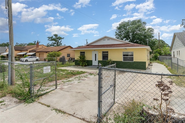 450 S Buena Vista Ave, Orlando, FL 32835 - view of front of property with a gate