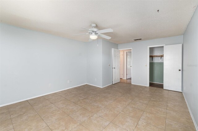 450 S Buena Vista Ave, Orlando, FL 32835 - unfurnished bedroom featuring baseboards, a closet, and ceiling fan
