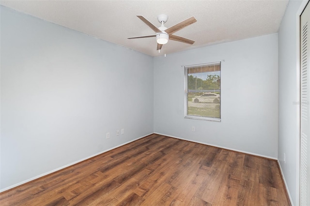 450 S Buena Vista Ave, Orlando, FL 32835 - spare room with ceiling fan, wood finished floors, and baseboards