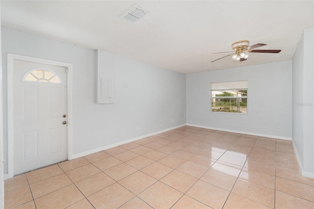 450 S Buena Vista Ave, Orlando, FL 32835 - entrance foyer with ceiling fan, light tile patterned floors, and baseboards