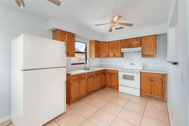450 S Buena Vista Ave, Orlando, FL 32835 - kitchen featuring white appliances, a ceiling fan, a sink, under cabinet range hood, and light countertops