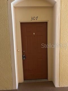 8775 Sartori St Unit 307, Orlando, FL 32829 - view of property entrance