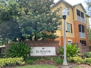8775 Sartori St Unit 307, Orlando, FL 32829 - view of community sign