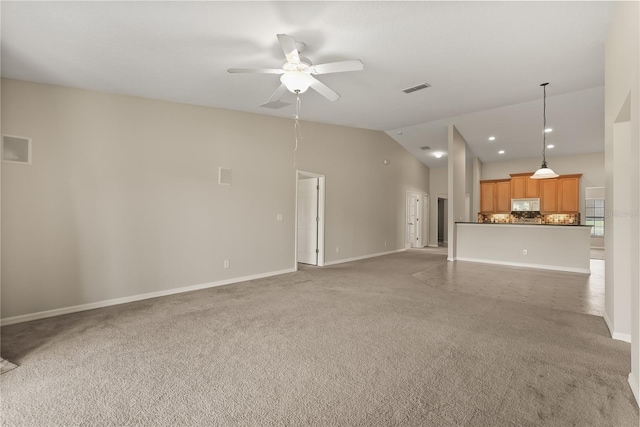 1227 Juniper Hammock St, Winter Garden, FL 34787 - unfurnished living room featuring lofted ceiling, light carpet, ceiling fan, and baseboards