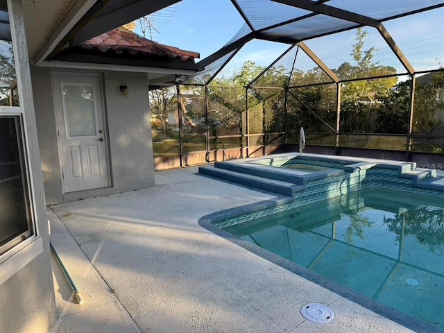 2 Bickshire Ln, Palm Coast, FL 32137 - view of pool featuring a patio, a pool with connected hot tub, and a lanai
