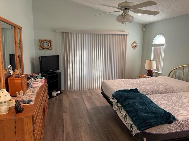 2 Bickshire Ln, Palm Coast, FL 32137 - bedroom with lofted ceiling, wood finished floors, a textured ceiling, and ceiling fan