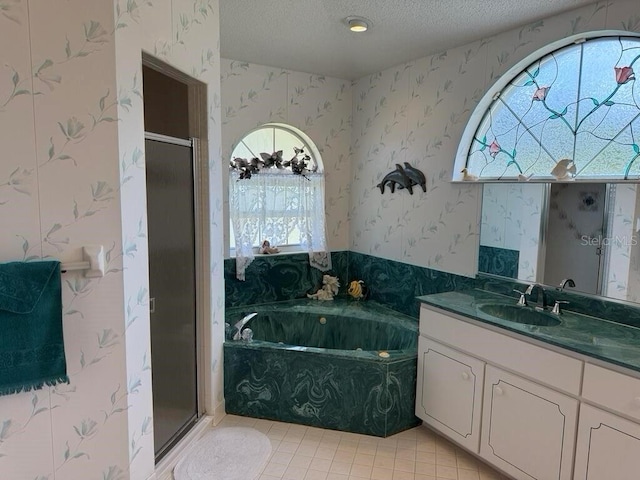 2 Bickshire Ln, Palm Coast, FL 32137 - full bathroom with wallpapered walls, a shower stall, a textured ceiling, vanity, and healthy amount of natural light