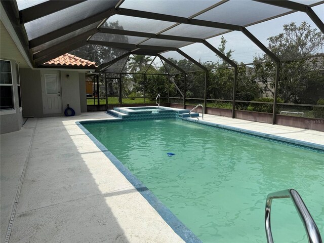 2 Bickshire Ln, Palm Coast, FL 32137 - view of pool with a patio and a pool with connected hot tub