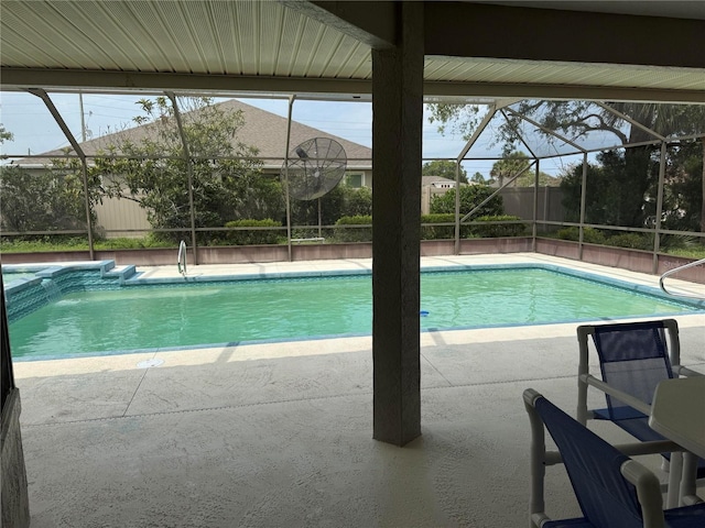 2 Bickshire Ln, Palm Coast, FL 32137 - swimming pool with a lanai and a patio area