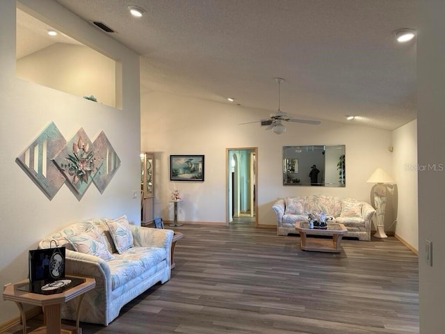 2 Bickshire Ln, Palm Coast, FL 32137 - living room featuring lofted ceiling, wood finished floors, a ceiling fan, baseboards, and recessed lighting