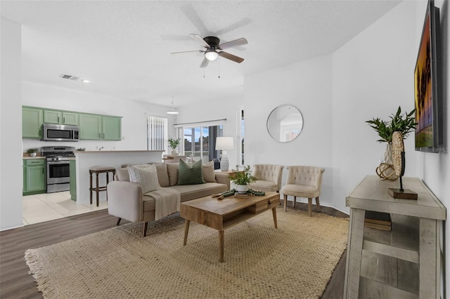 468 Jaybee Ave, Davenport, FL 33897 - living area with light wood-style floors, a ceiling fan, and recessed lighting