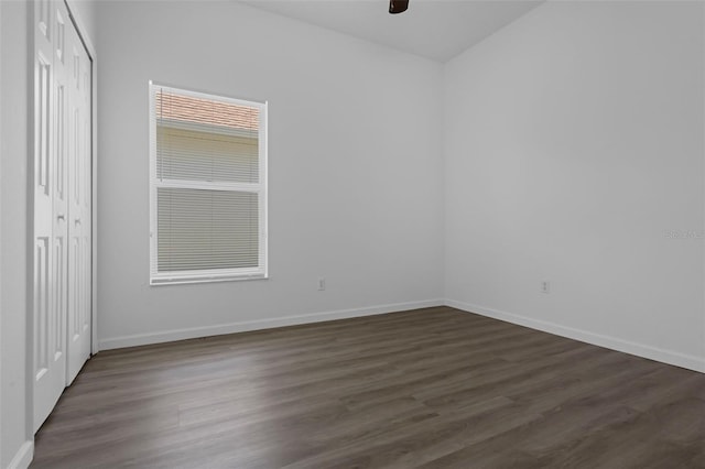 468 Jaybee Ave, Davenport, FL 33897 - spare room with ceiling fan, dark wood-style floors, and baseboards