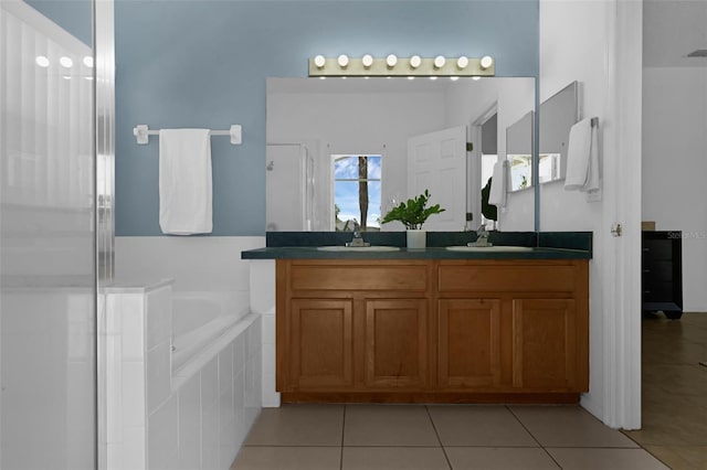 468 Jaybee Ave, Davenport, FL 33897 - full bathroom featuring tile patterned flooring, double vanity, a bath, and an enclosed shower