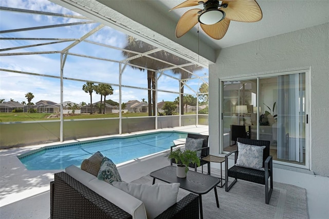 468 Jaybee Ave, Davenport, FL 33897 - swimming pool featuring a patio, a ceiling fan, outdoor lounge area, and glass enclosure