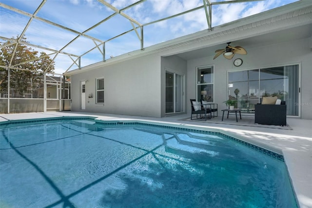 468 Jaybee Ave, Davenport, FL 33897 - swimming pool featuring a patio area, a ceiling fan, and glass enclosure
