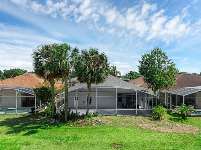 468 Jaybee Ave, Davenport, FL 33897 - rear view of property with a yard, a lanai, and an outdoor pool