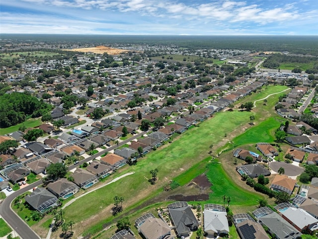 468 Jaybee Ave, Davenport, FL 33897 - aerial view of property and surrounding area with a golf course and nearby suburban area