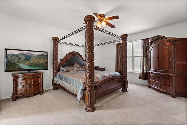 3868 Whitewood Ct, Oviedo, FL 32766 - bedroom with light colored carpet, a ceiling fan, and baseboards