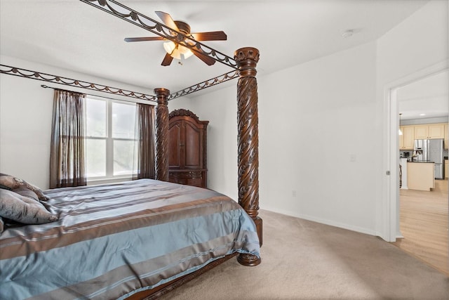 3868 Whitewood Ct, Oviedo, FL 32766 - bedroom featuring stainless steel fridge, light carpet, baseboards, and a ceiling fan