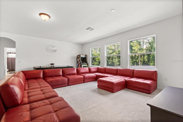 3868 Whitewood Ct, Oviedo, FL 32766 - carpeted living area featuring arched walkways