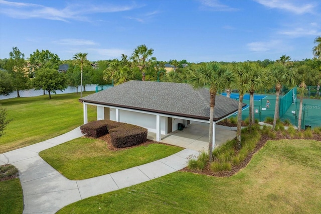 3868 Whitewood Ct, Oviedo, FL 32766 - view of home's exterior with a water view and a shingled roof