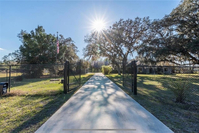 6917 Roman Ct, Clermont, FL 34714 - view of property's community with a gate