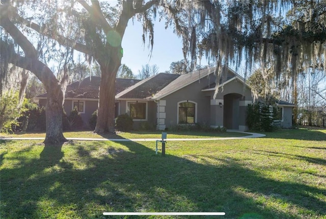 6917 Roman Ct, Clermont, FL 34714 - single story home with a front yard and stucco siding