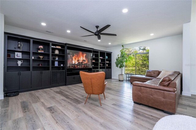 6917 Roman Ct, Clermont, FL 34714 - living room with recessed lighting, ceiling fan, light wood finished floors, and baseboards