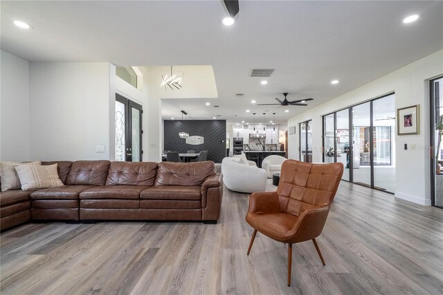 6917 Roman Ct, Clermont, FL 34714 - living area featuring light wood-style floors and recessed lighting