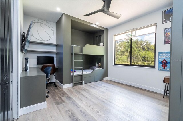 6917 Roman Ct, Clermont, FL 34714 - home office featuring ceiling fan, wood finished floors, baseboards, and recessed lighting