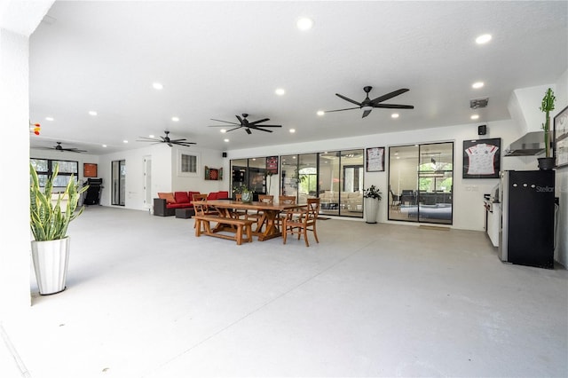 6917 Roman Ct, Clermont, FL 34714 - dining area with recessed lighting, healthy amount of natural light, ceiling fan, and finished concrete floors