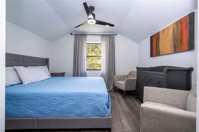 6917 Roman Ct, Clermont, FL 34714 - bedroom featuring wood finished floors, vaulted ceiling, and ceiling fan