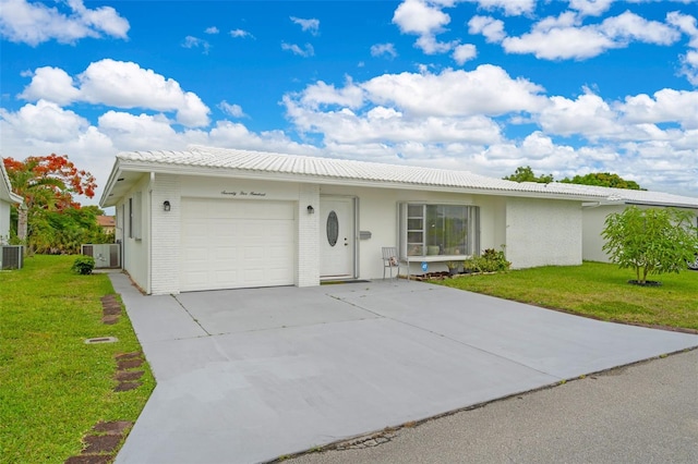 7500 NW 66th Ter, Tamarac, FL 33321 - single story home with a garage, a front lawn, concrete driveway, and central air condition unit