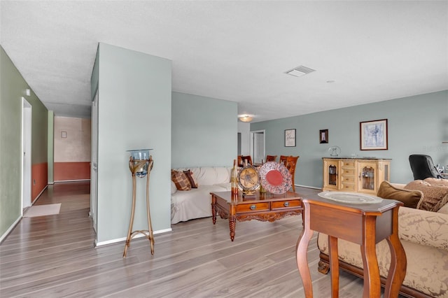 7500 NW 66th Ter, Tamarac, FL 33321 - living room with wood finished floors and baseboards