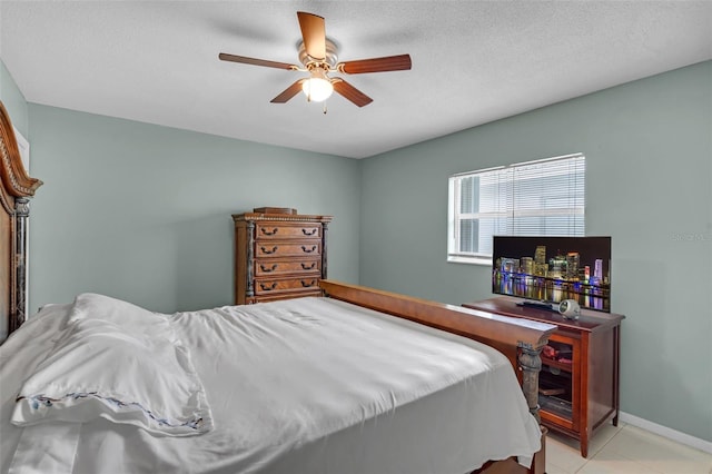 7500 NW 66th Ter, Tamarac, FL 33321 - bedroom featuring light tile patterned flooring, ceiling fan, and baseboards