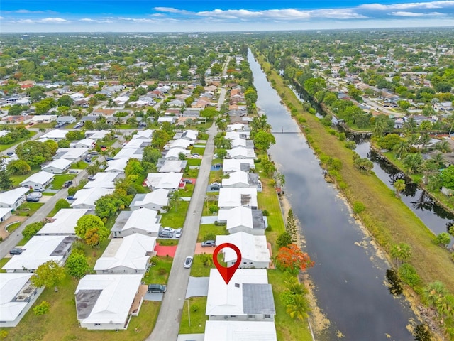 7500 NW 66th Ter, Tamarac, FL 33321 - aerial view of residential area with a large body of water
