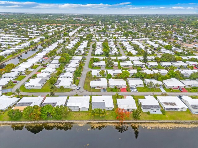 7500 NW 66th Ter, Tamarac, FL 33321 - aerial view of residential area with a nearby body of water