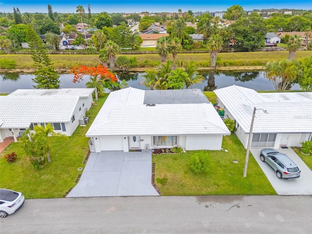 7500 NW 66th Ter, Tamarac, FL 33321 - aerial view of residential area with a nearby body of water