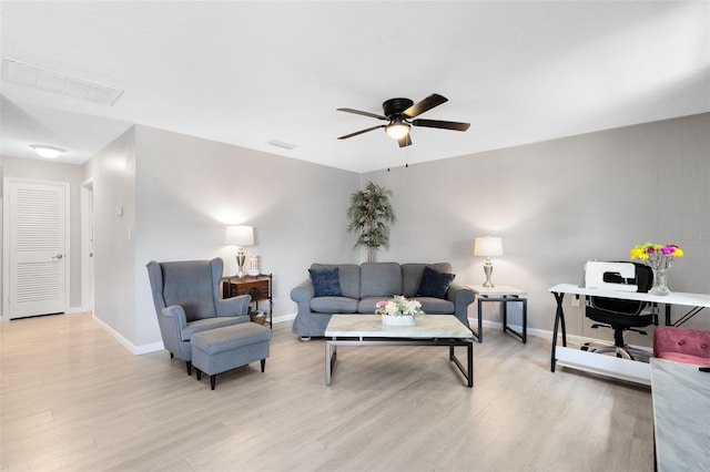 117 Georgetown Dr Unit C, Casselberry, FL 32707 - living room featuring a ceiling fan, wood finished floors, and baseboards