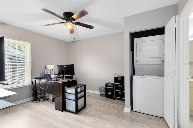 117 Georgetown Dr Unit C, Casselberry, FL 32707 - office featuring stacked washer / drying machine, ceiling fan, baseboards, and light wood-style floors