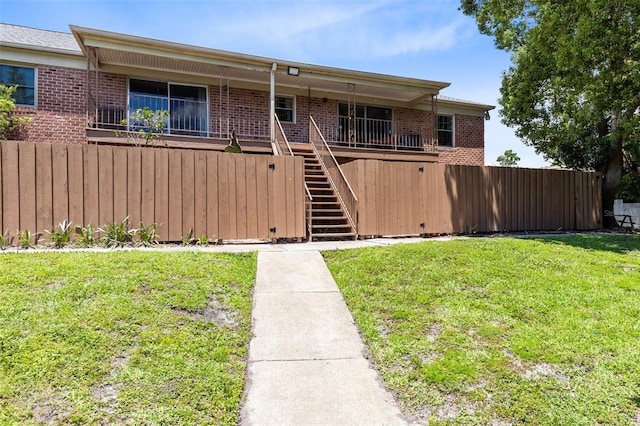 117 Georgetown Dr Unit C, Casselberry, FL 32707 - view of front of property featuring brick siding and stairway