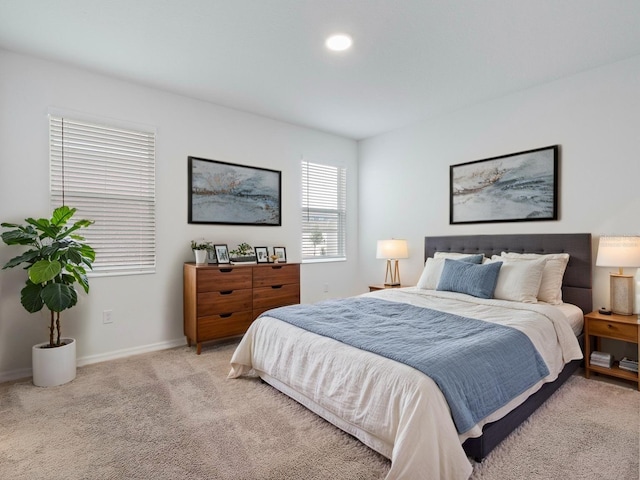 12009 Walmsley Aly, Winter Garden, FL 34787 - bedroom with light carpet, baseboards, and recessed lighting