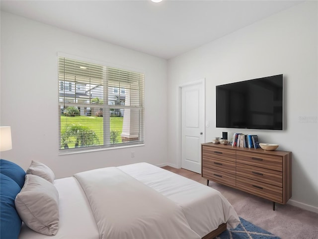 12009 Walmsley Aly, Winter Garden, FL 34787 - bedroom featuring carpet flooring and baseboards