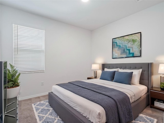12009 Walmsley Aly, Winter Garden, FL 34787 - bedroom featuring light colored carpet and baseboards
