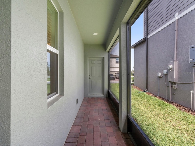 12009 Walmsley Aly, Winter Garden, FL 34787 - unfurnished sunroom with plenty of natural light